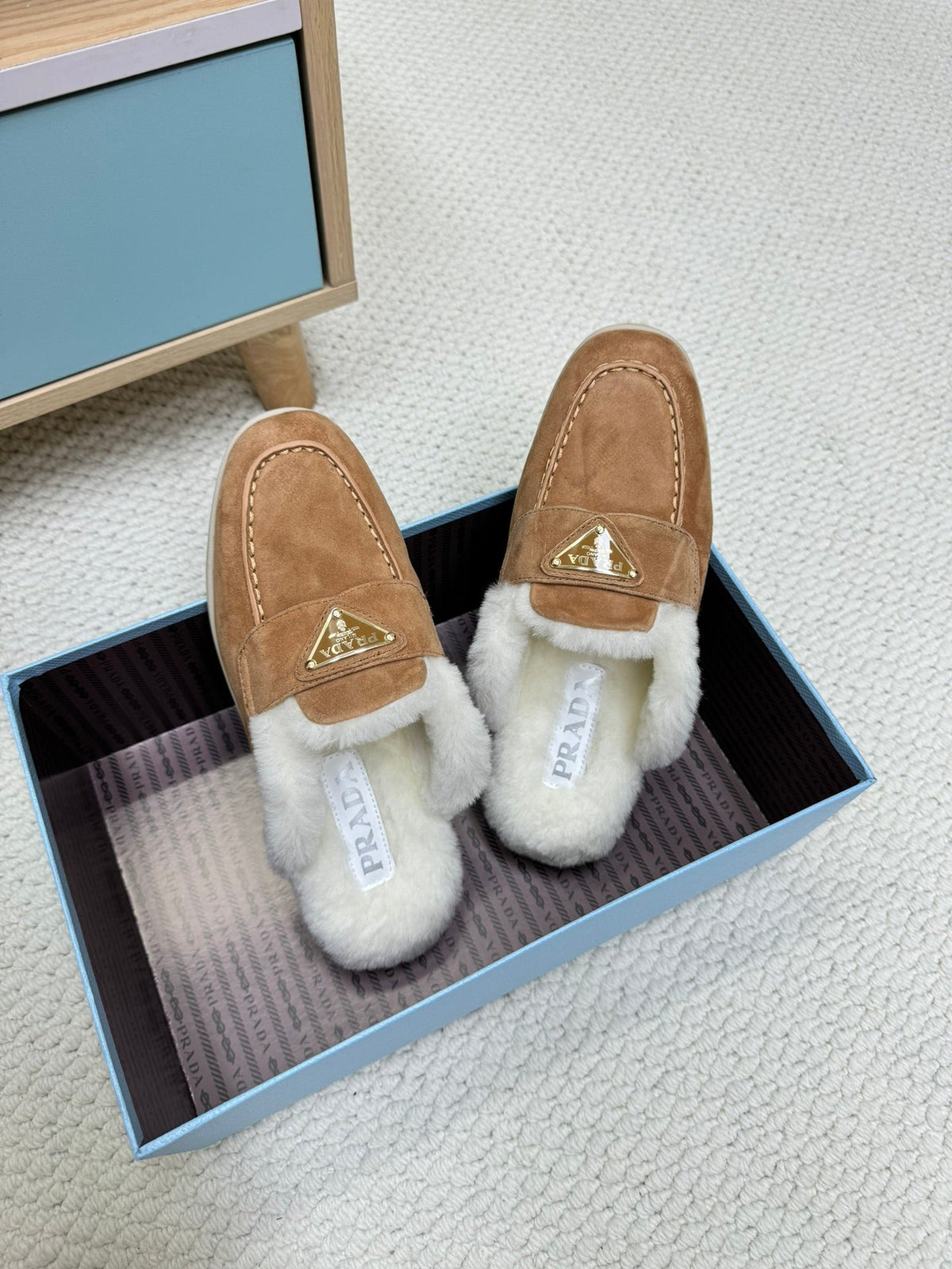 PRADA TRIANGLE LOGO FLATS IN CAMEL SUEDE AND FUR LINING