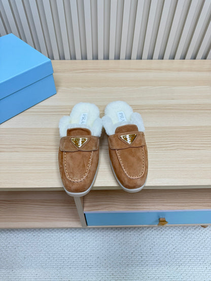 PRADA TRIANGLE LOGO FLATS IN CAMEL SUEDE AND FUR LINING