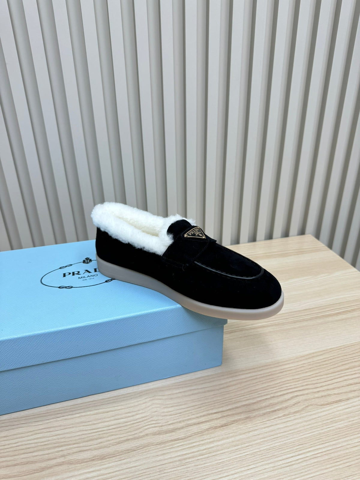 PRADA LOAFER IN BLACK SUEDE AND FUR LINING ATTACHED TRIANGLE LOGO