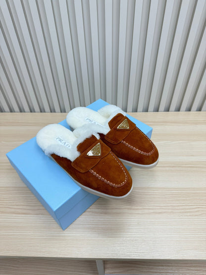 PRADA TRIANGLE LOGO FLATS IN RED BROWN SUEDE AND FUR LINING