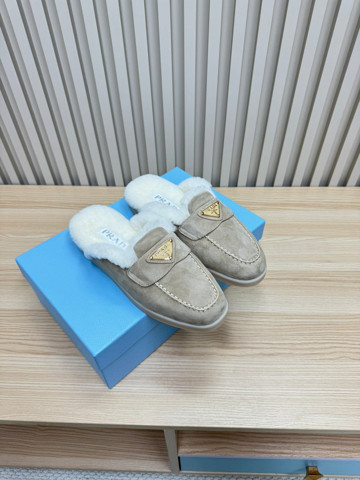 PRADA TRIANGLE LOGO FLATS IN KHAKI BEIGE SUEDE AND FUR LINING