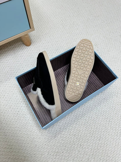 PRADA TRIANGLE LOGO FLATS IN BLACK SUEDE AND FUR LINING