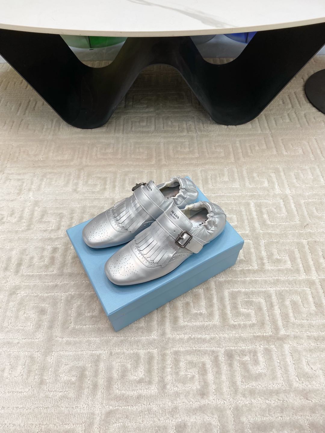 PRADA TASSEL LOAFERS IN SILVER METALLIC LAMBSKIN