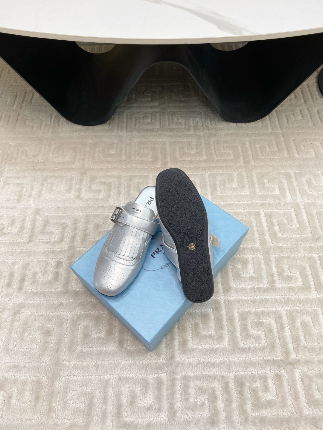 PRADA TASSEL MULES IN SILVER METALLIC LAMBSKIN