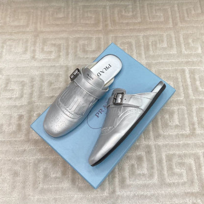 PRADA TASSEL MULES IN SILVER METALLIC LAMBSKIN