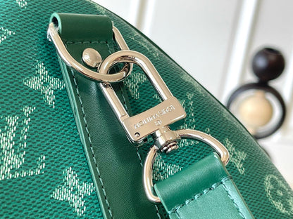 LOUIS VUITTON KEEPALL BANDOULIÈRE 50 IN GREEN MONOGRAM HERITAGE CANVAS