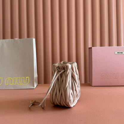 MIU MIU MIUMIU 26S MATELASSE POUCH BAG 16 IN LIGHT BEIGE CALFSKIN GOLD HARDWARE
