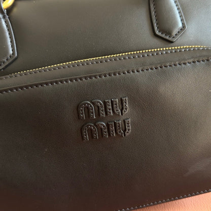 MIU MIU MIUMIU 26S POCKET TOP-HANDLE BAG 32 IN BLACK CALFSKIN GOLD HARDWARE