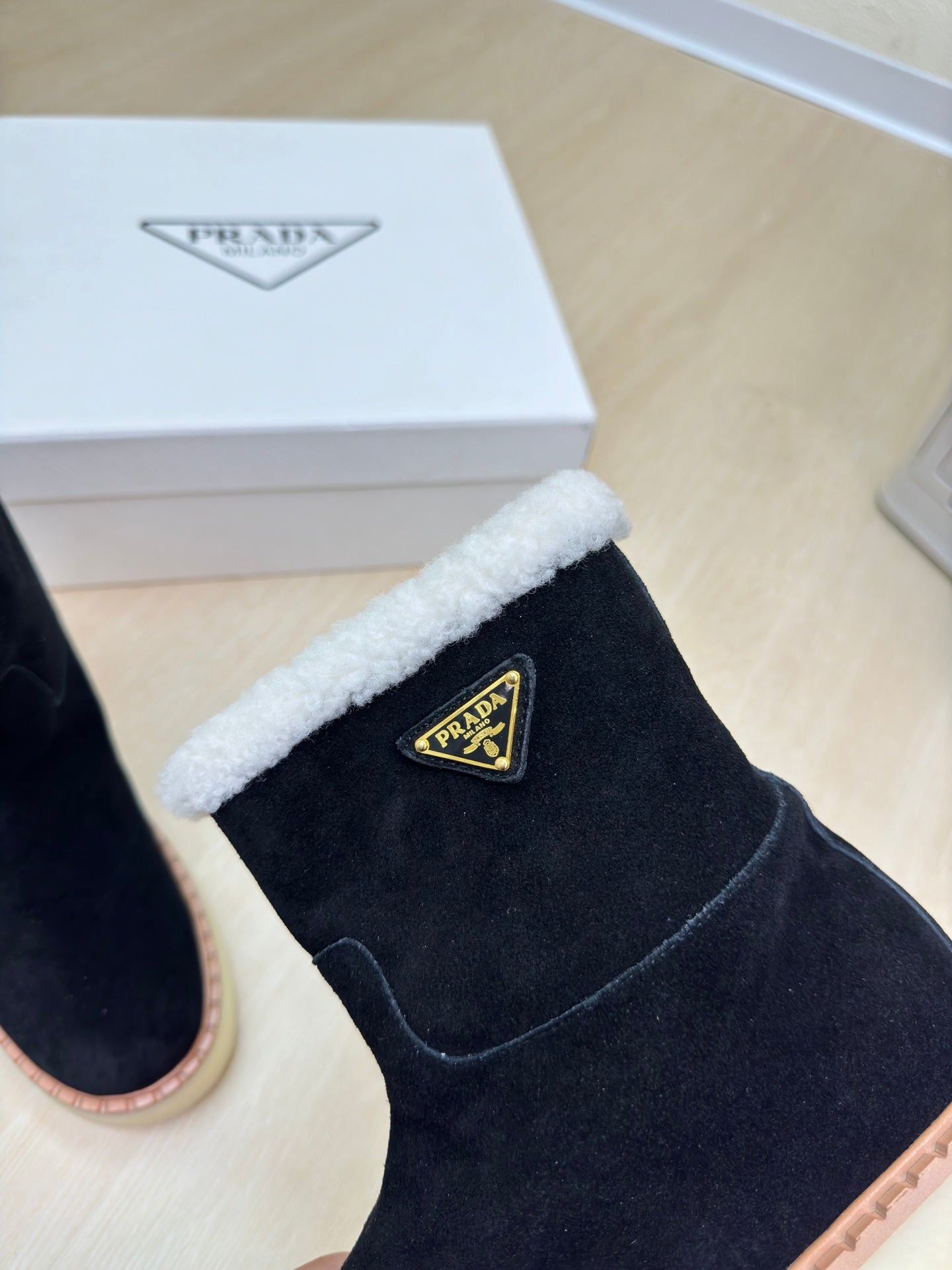 PRADA SUEDE BOOTS BLACK WITH SHEARLING LINING AND RUBBER FLATFORM SOLE