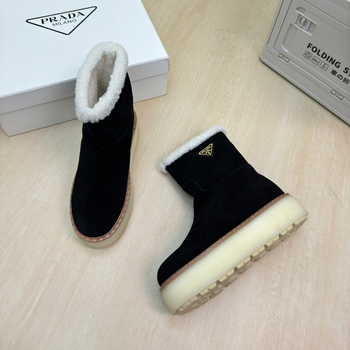 PRADA SUEDE BOOTS BLACK WITH SHEARLING LINING AND RUBBER FLATFORM SOLE