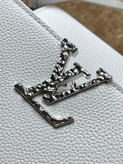 LOUIS VUITTON CAPUCINES EAST-WEST 33 IN WHITE CALFSKIN SILVER HARDWARE