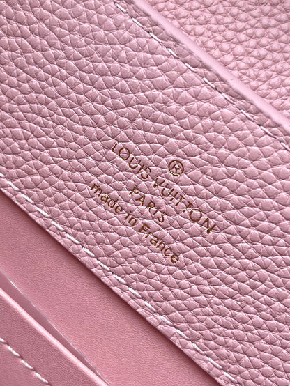 LOUIS VUITTON CAPUCINES EAST-WEST 33 IN BLUSH PINK CALFSKIN GOLD HARDWARE