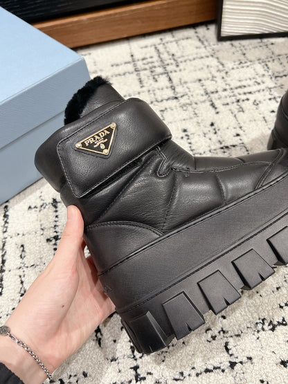 PRADA MONOLITH ANKLE BOOTS WITH STRAP IN BLACK CALFSKIN AND FLEECE LINING