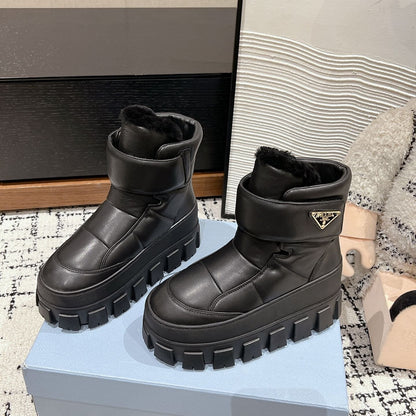PRADA MONOLITH ANKLE BOOTS WITH STRAP IN BLACK CALFSKIN AND FLEECE LINING