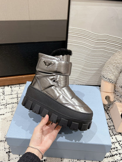 PRADA MONOLITH ANKLE BOOTS WITH STRAP IN METALLIC GRAY CALFSKIN AND FLEECE LINING