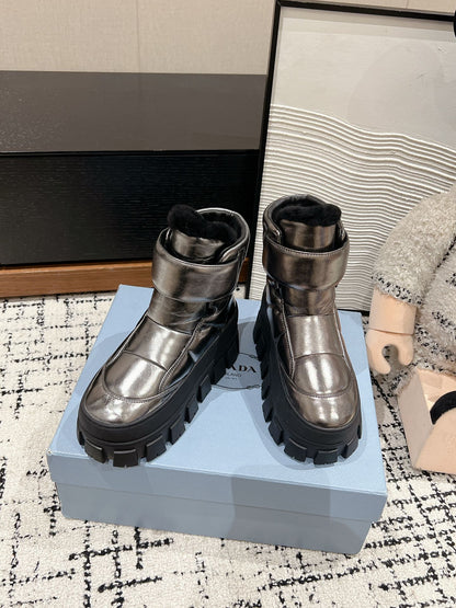 PRADA MONOLITH ANKLE BOOTS WITH STRAP IN METALLIC GRAY CALFSKIN AND FLEECE LINING