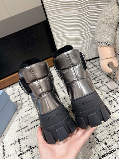 PRADA MONOLITH ANKLE BOOTS WITH STRAP IN METALLIC GRAY CALFSKIN AND FLEECE LINING