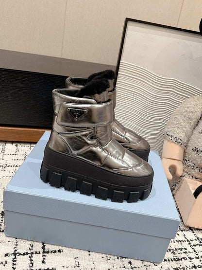 PRADA MONOLITH ANKLE BOOTS WITH STRAP IN METALLIC GRAY CALFSKIN AND FLEECE LINING