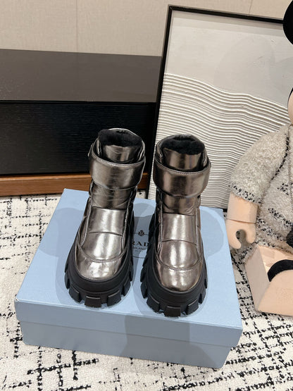 PRADA MONOLITH ANKLE BOOTS WITH STRAP IN METALLIC GRAY CALFSKIN AND FLEECE LINING
