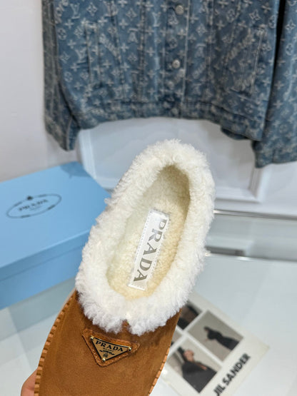 PRADA TRIANGLE LOGO MULES IN BRONZE BROWN SUEDE AND SHEARLING LINING