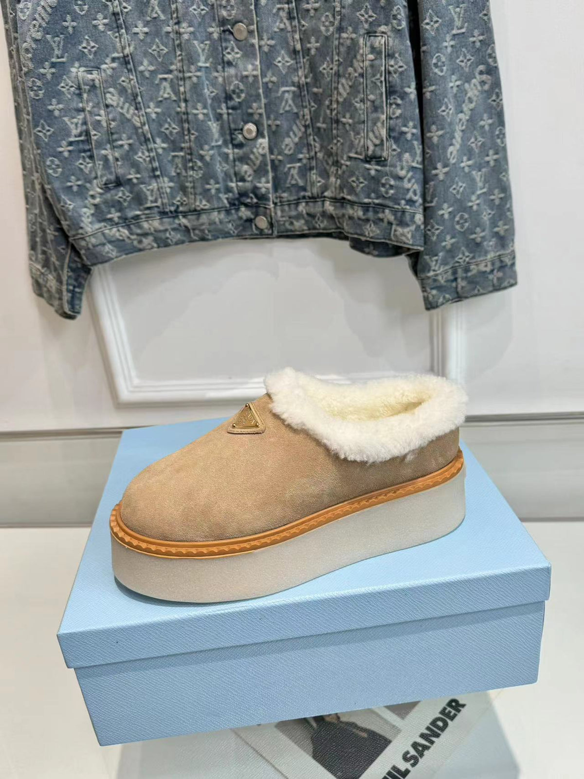 PRADA TRIANGLE LOGO MULES IN BEIGE SUEDE AND SHEARLING LINING