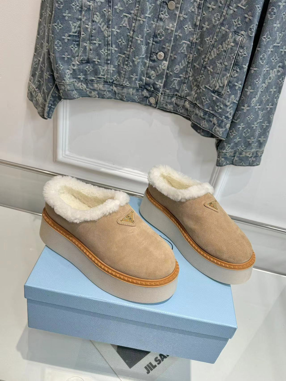 PRADA TRIANGLE LOGO MULES IN BEIGE SUEDE AND SHEARLING LINING