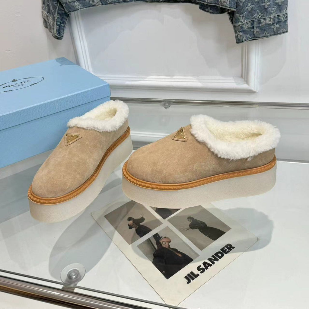 PRADA TRIANGLE LOGO MULES IN BEIGE SUEDE AND SHEARLING LINING