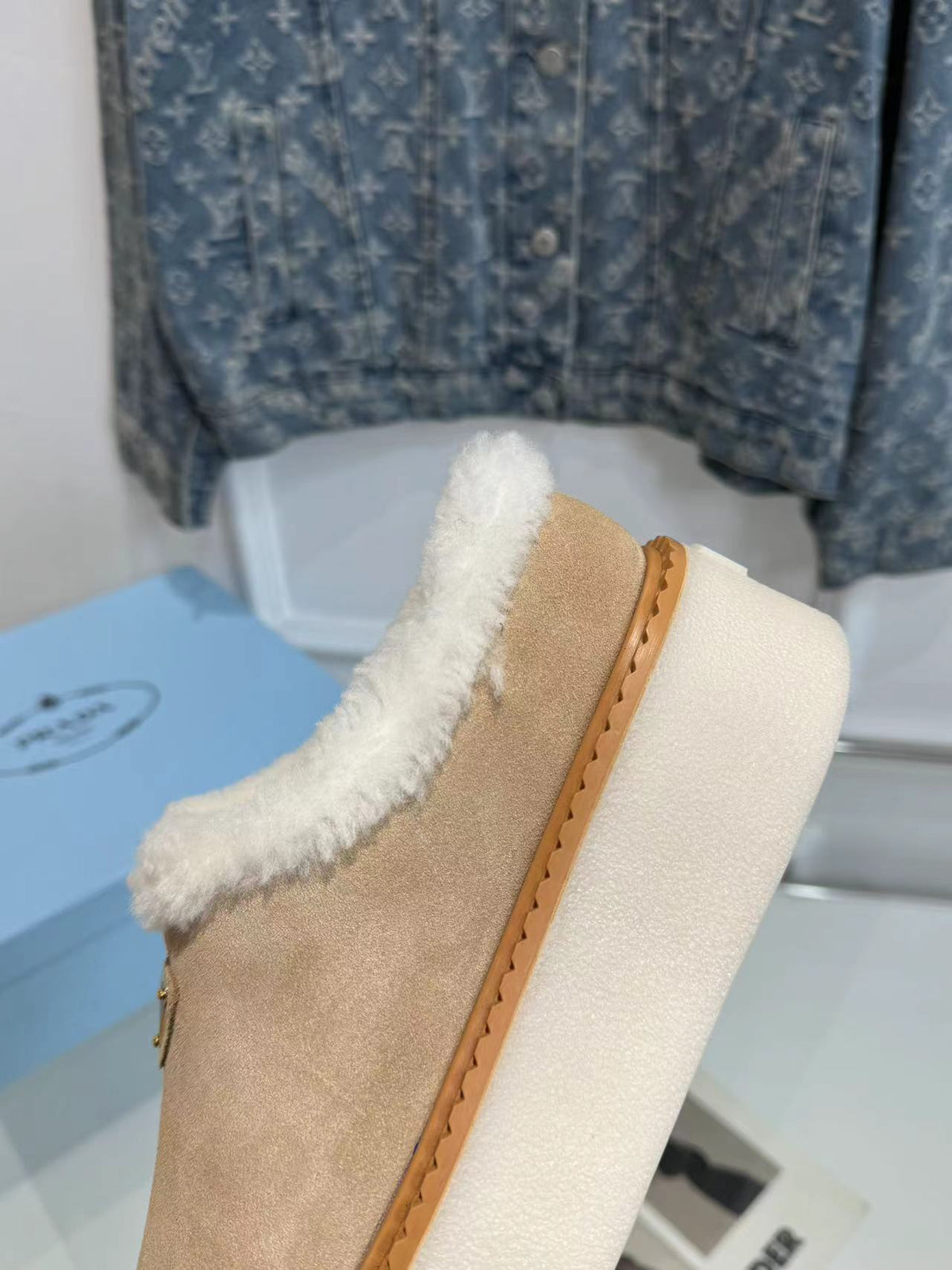 PRADA TRIANGLE LOGO MULES IN BEIGE SUEDE AND SHEARLING LINING