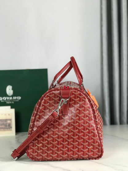 GOYARD BOSTON 50 BAG IN RED GOYARDINE CANVAS AND CALFSKIN TRIM