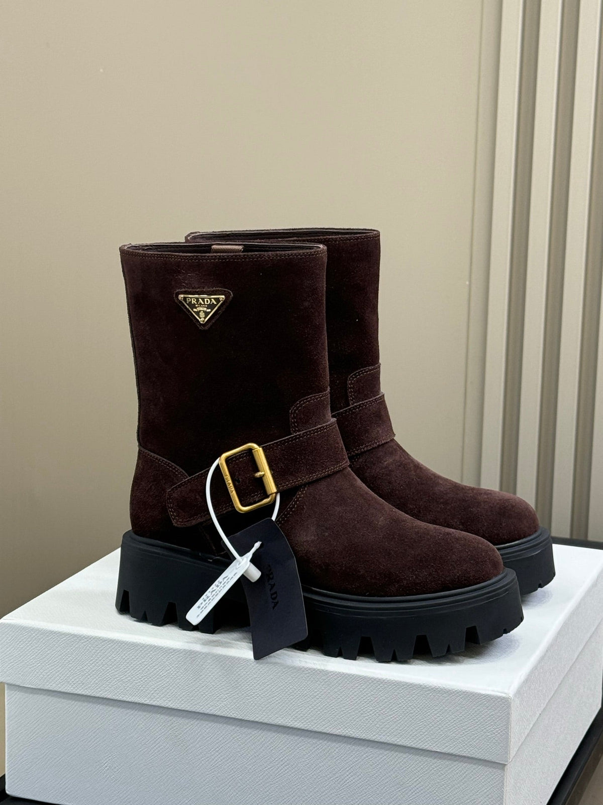 PRADA 25S PLATFORM ANKLE BOOTS IN RK BROWN SUEDE WITH GOLD HARDWARE