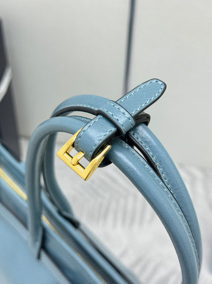 PRADA 25S LUX SOFT BAG 42 IN BLUE GLOSSY CALFSKIN GOLD HARDWARE