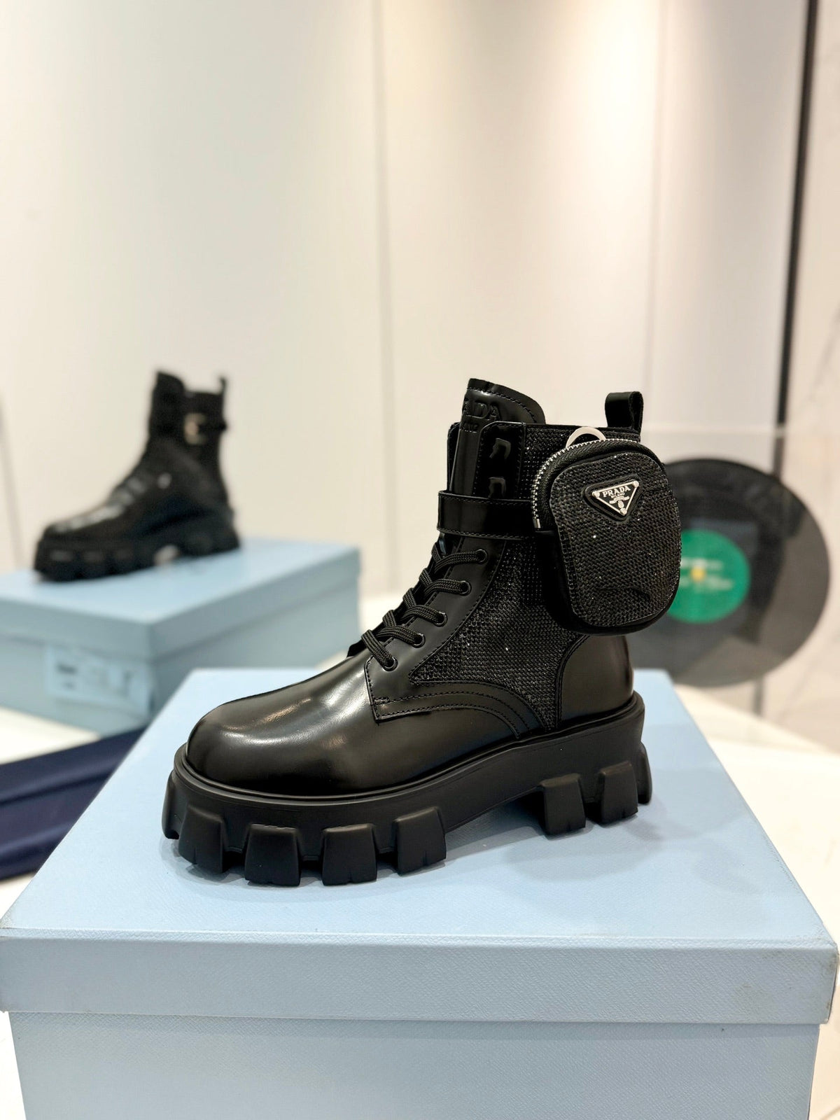 PRADA MONOLITH BRUSHED AND RE-NYLON BOOTS WITH POUCH TWINKLE BLACK CALFSKIN