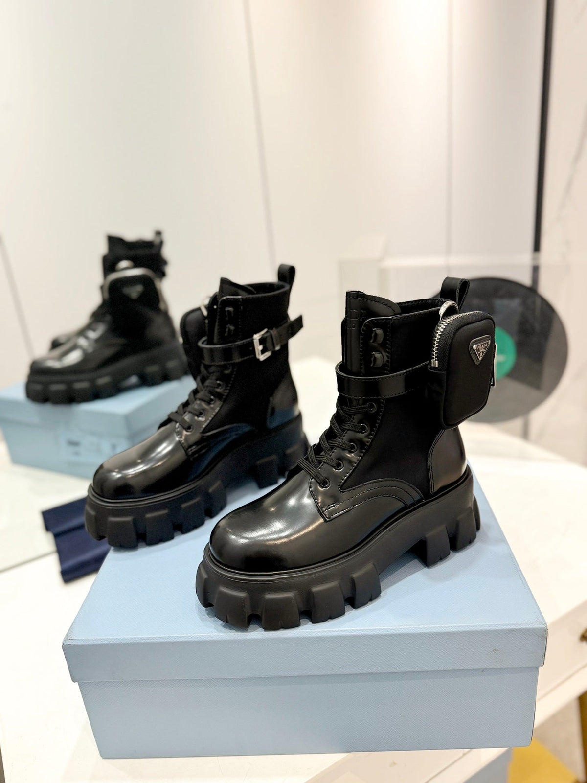 PRADA MONOLITH BRUSHED AND RE-NYLON BOOTS WITH POUCH BLACK CALFSKIN