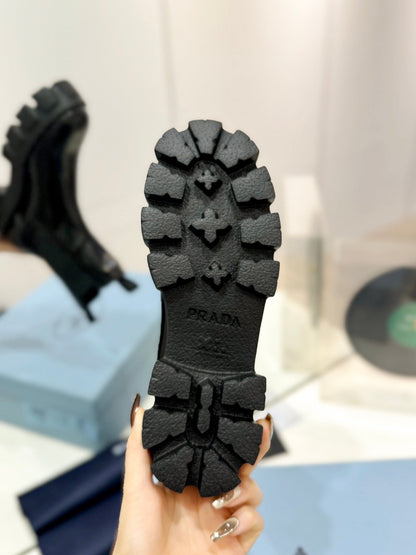 PRADA MONOLITH BRUSHED LEATHER BOOTIES BLACK