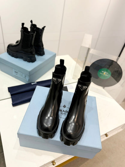 PRADA MONOLITH BRUSHED LEATHER BOOTIES BLACK