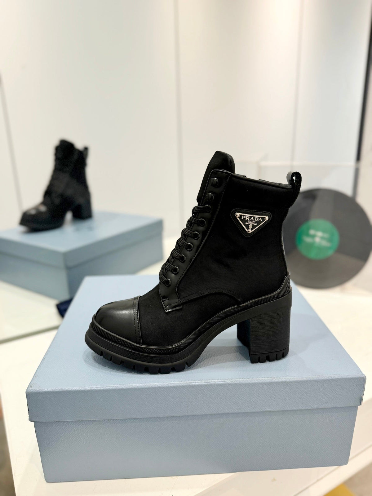 PRADA BRUSHED LEATHER AND RE-NYLON LACED BOOTIES BLACK