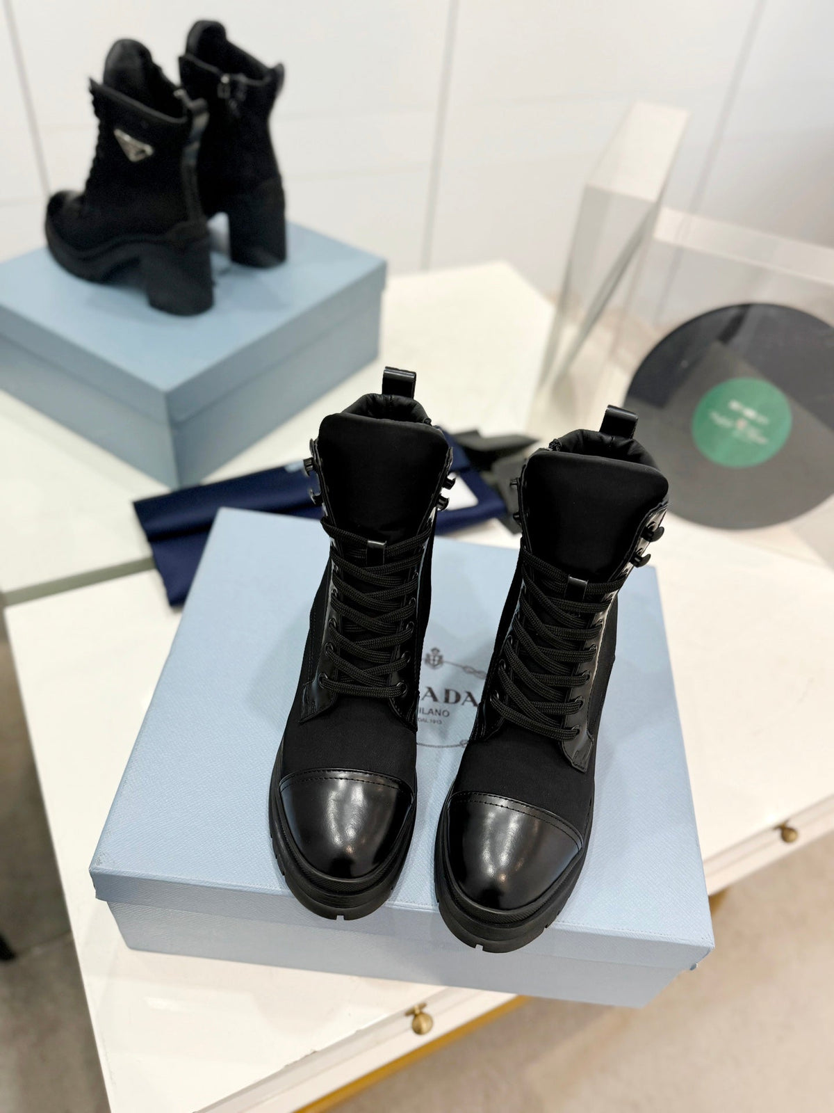 PRADA BRUSHED LEATHER AND RE-NYLON LACED BOOTIES BLACK
