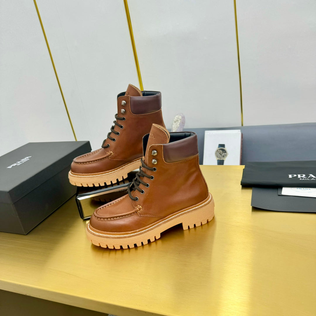 PRADA LACE-UP ANKLE BOOTS IN COGNAC CALFSKIN