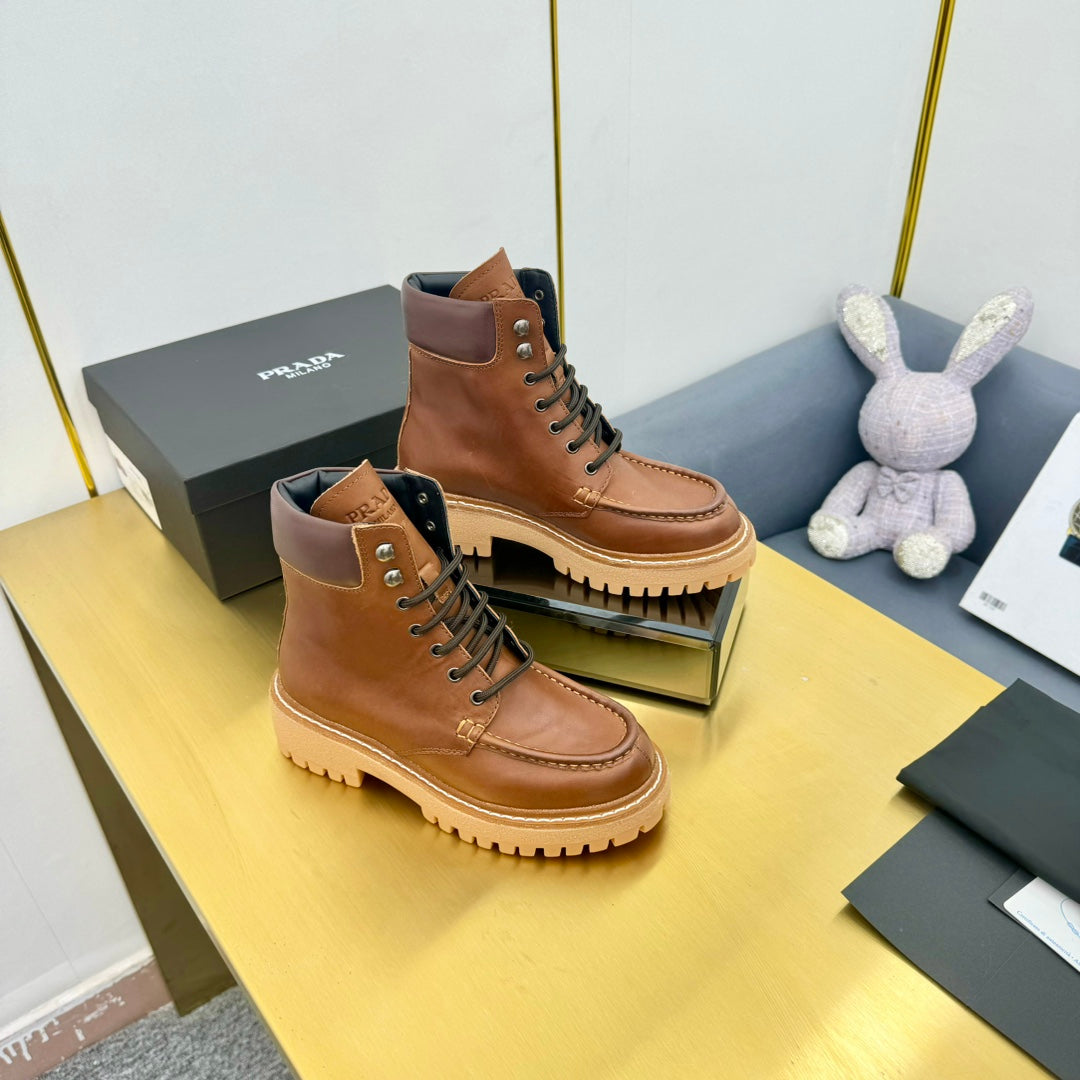 PRADA LACE-UP ANKLE BOOTS IN COGNAC CALFSKIN