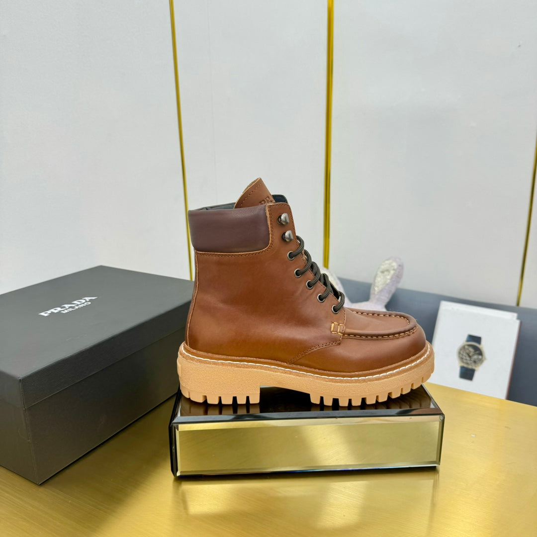 PRADA LACE-UP ANKLE BOOTS IN COGNAC CALFSKIN
