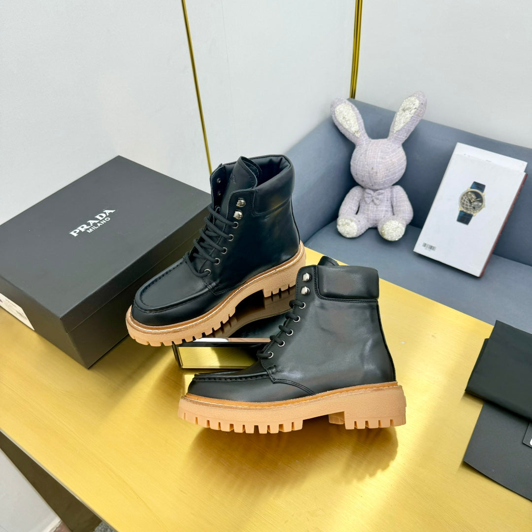 PRADA LACE-UP ANKLE BOOTS IN BLACK CALFSKIN