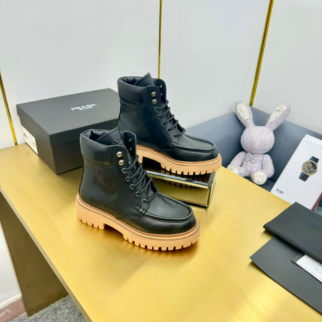 PRADA LACE-UP ANKLE BOOTS IN BLACK CALFSKIN