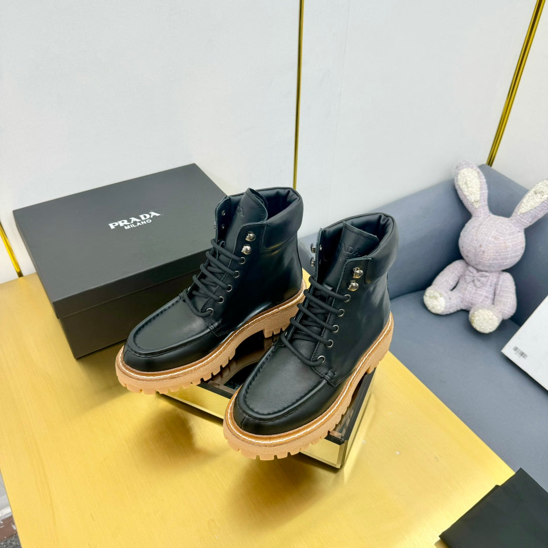 PRADA LACE-UP ANKLE BOOTS IN BLACK CALFSKIN