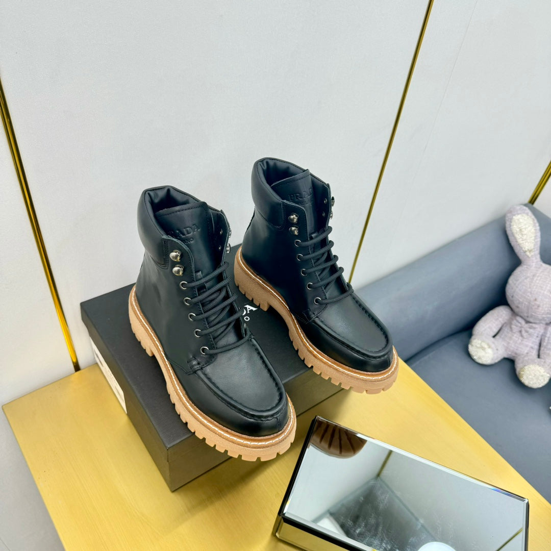 PRADA LACE-UP ANKLE BOOTS IN BLACK CALFSKIN