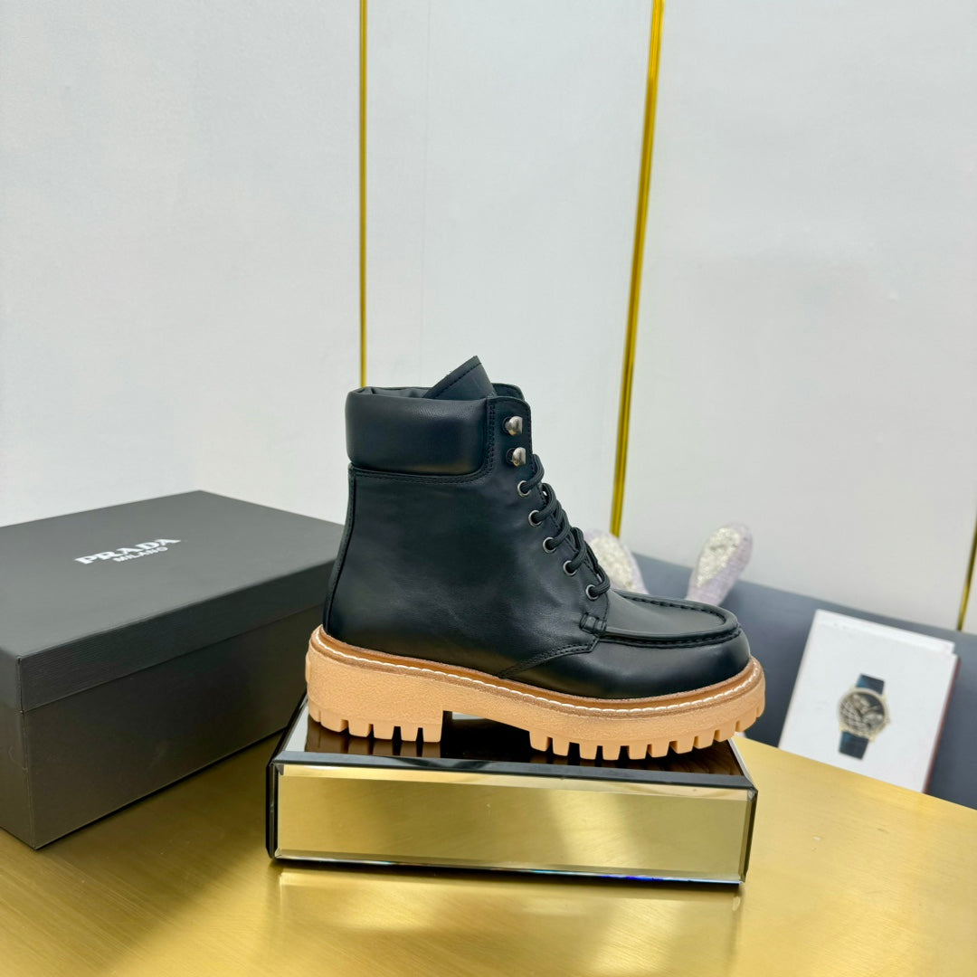 PRADA LACE-UP ANKLE BOOTS IN BLACK CALFSKIN