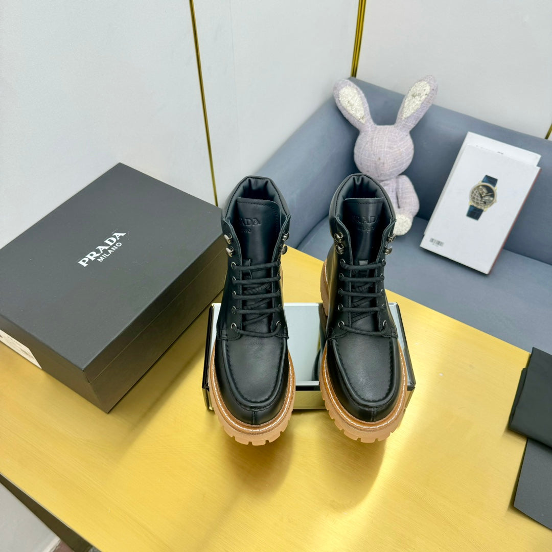 PRADA LACE-UP ANKLE BOOTS IN BLACK CALFSKIN