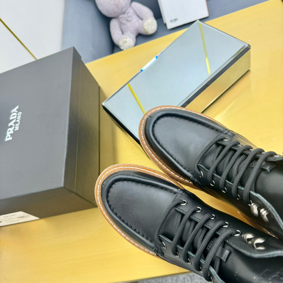 PRADA LACE-UP ANKLE BOOTS IN BLACK CALFSKIN