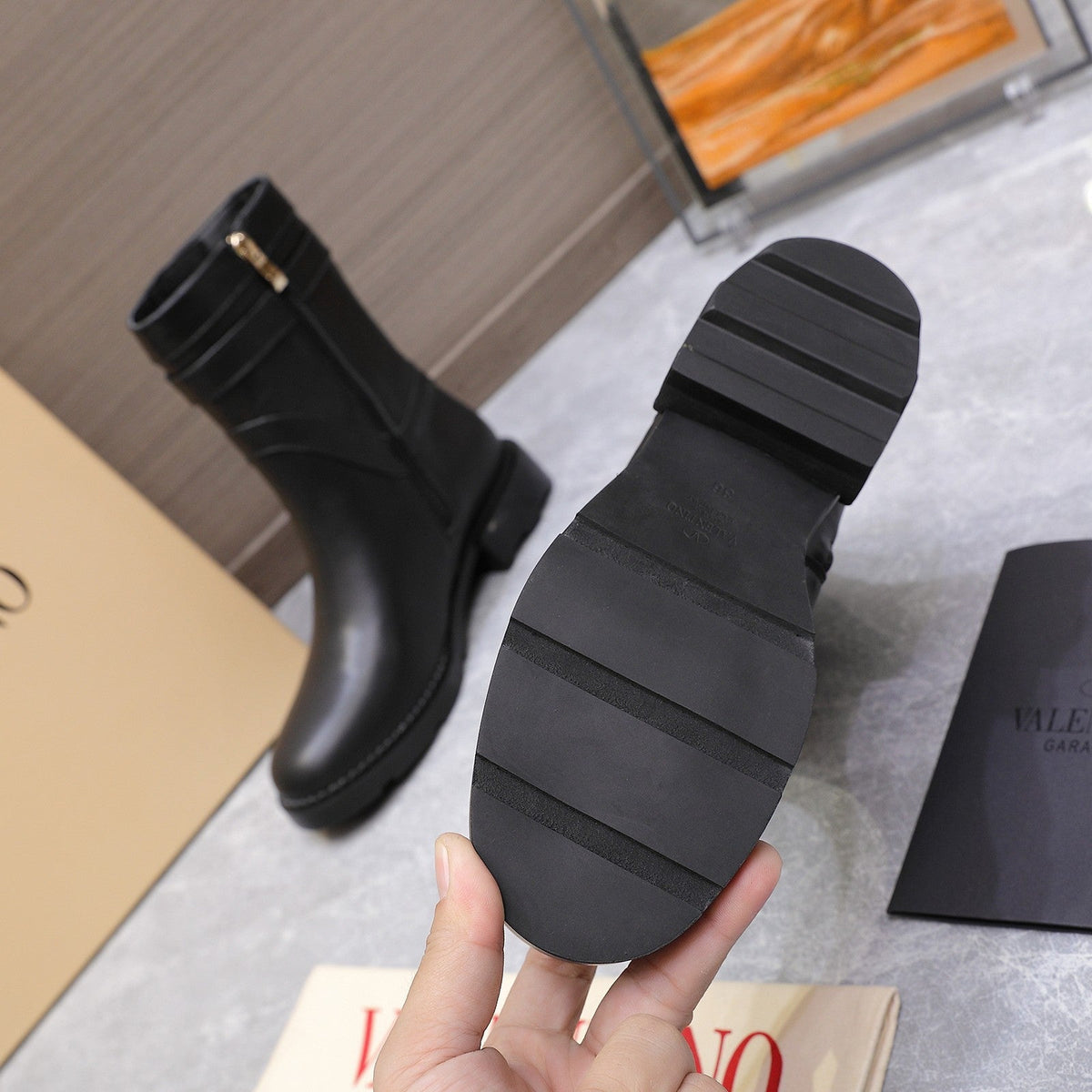 VALENTINO 25S FLAT ANKLE BOOTS IN BLACK CALFSKIN