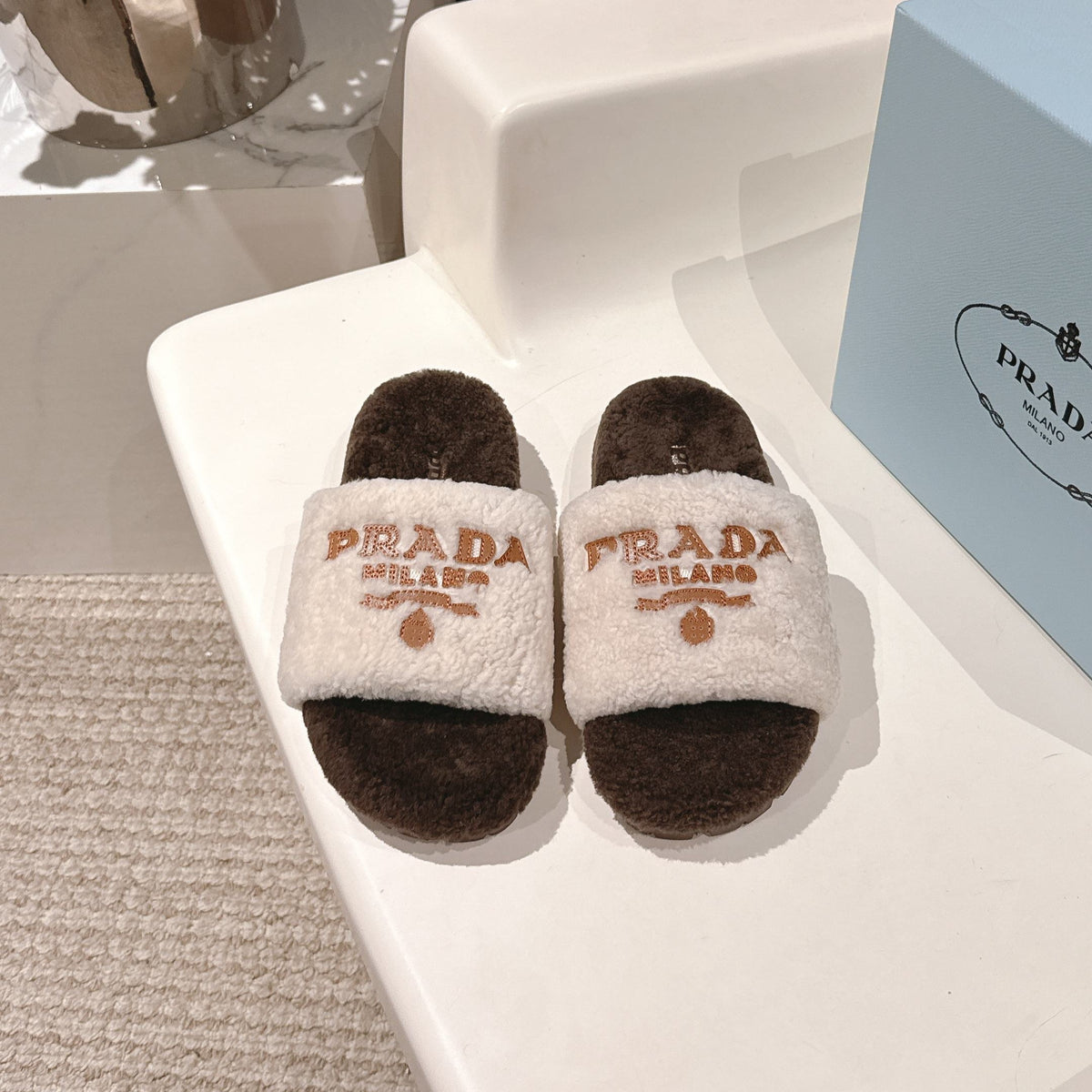 PRADA 25S FLAT MULES IN WHITE AND RK BROWN RABBIT FUR