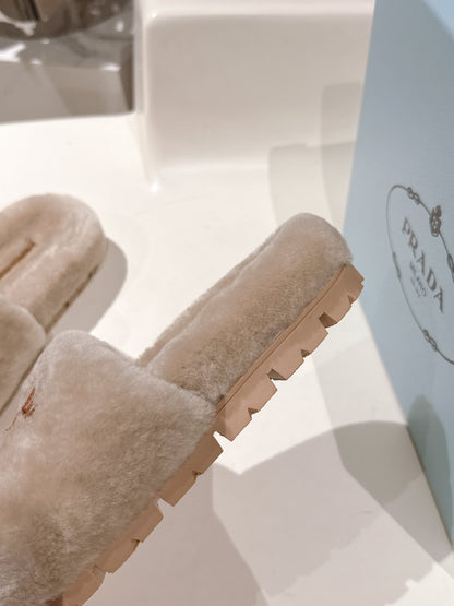PRADA 25S FLAT MULES IN WARM TAUPE RABBIT FUR